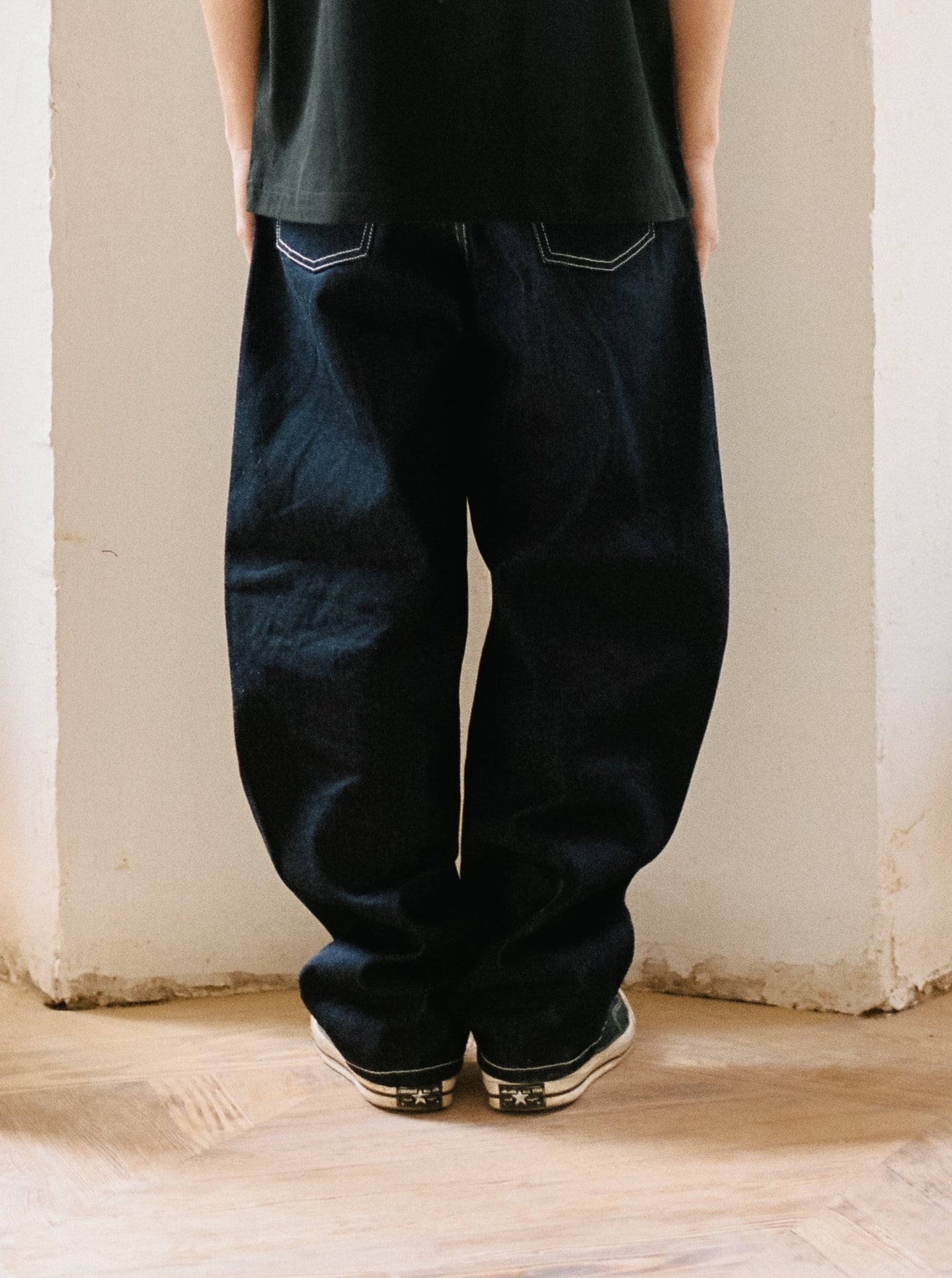 TWISTED SEAM DENIM PANTS